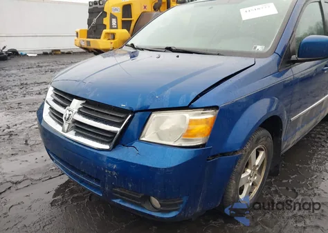 2010 Dodge Grand Caravan Sxt z USA, uszkodzony, nr VIN 2D4RN5D1XAR107334